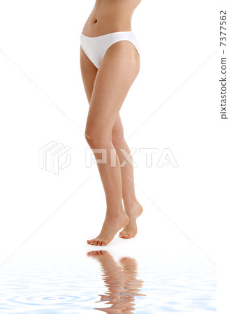 long legs in bikini panties on white sand long legs in bikini panties on white sand 7377562
