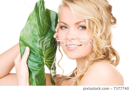 woman with green leaf woman with green leaf 7377740