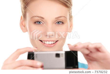 happy woman using phone camera happy woman using phone camera 7378232
