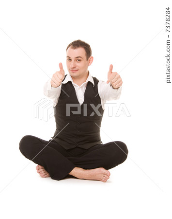 businessman sitting in lotus pose businessman sitting in lotus pose 7378284
