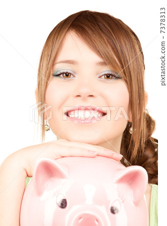 lovely teenage girl with piggy bank lovely teenage girl with piggy bank 7378313