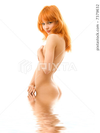 smiling redhead in water 7379632