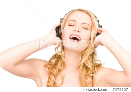 happy woman in headphones happy woman in headphones 7379807