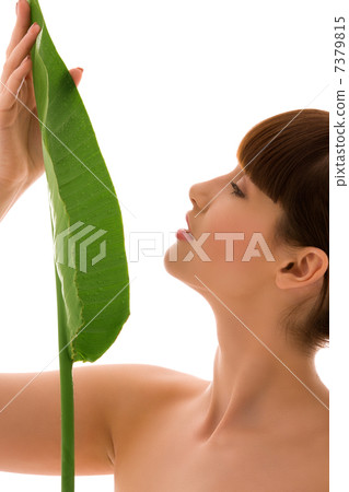 woman with green leaf woman with green leaf 7379815