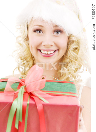 cheerful santa helper girl with gift box cheerful santa helper girl with gift box 7380497