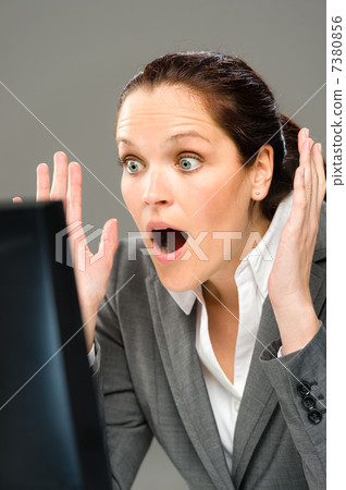 Portrait of worried overcharged businesswoman Portrait of worried overcharged businesswoman 7380856