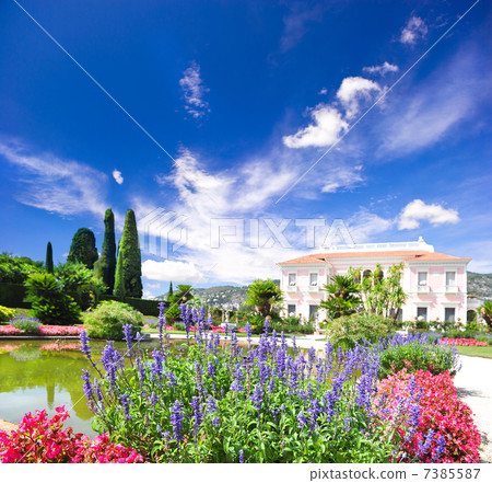 landscape with colorful flowers and blue sky landscape with colorful flowers and blue sky 7385587