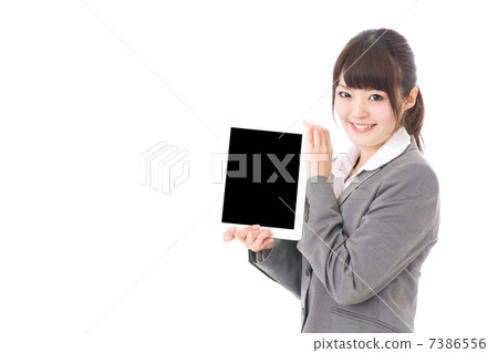 Business woman showing tablet image Business woman showing tablet image 7386556