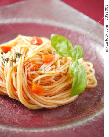 Pomodoro on a glass plate (vertical image) 7388001