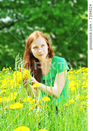 woman on blossoming field woman on blossoming field 7394024