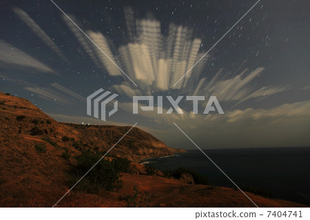 Night landscape, night sky with moving stars Night landscape, night sky with moving stars 7404741