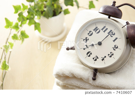 Alarm Clock and Towel 7410607