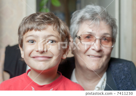 portrait of a senior woman and grandson portrait of a senior woman and grandson 7411230