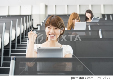 University student tablet + guts pose 7412177