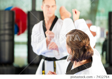 Martial Arts sport training in gym Martial Arts sport training in gym 7412764