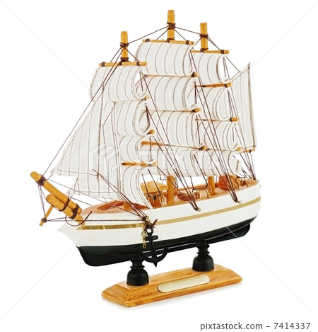 Old sailboat model isolated on white background. 7414337