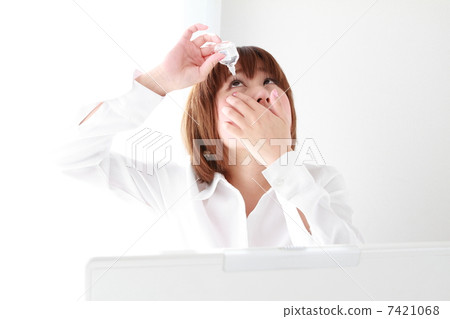 Business woman marking eye drops Business woman marking eye drops 7421068