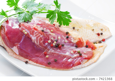 Marinated duck fillet on a white background 7421368