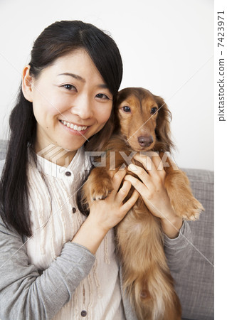 A woman who loves dogs A woman who loves dogs 7423971