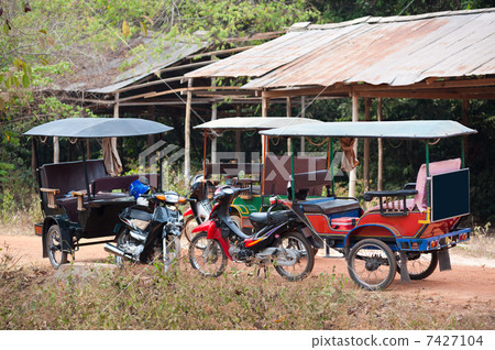 empty tuktuks, Cambodia 7427104