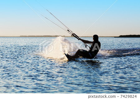 Silhouette of a kitesurfer 7429824