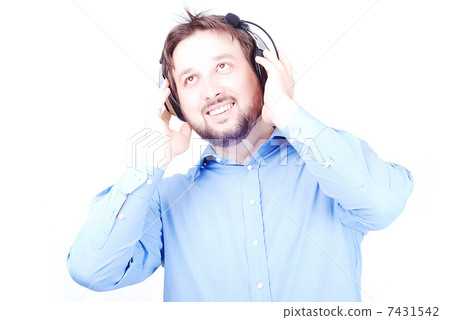 Young white beautiful man with headphones 7431542