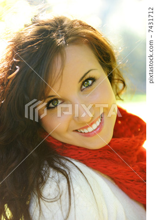 Beautiful happy girl in nature, portrait, long brown hair Beautiful happy girl in nature, portrait, long brown hair 7431712