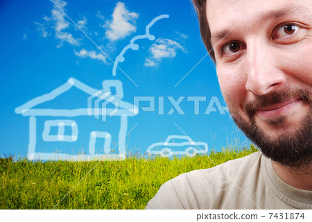 Happy young man with imagination of house and car on beautiful meadow Happy young man with imagination of house and car on beautiful meadow 7431874