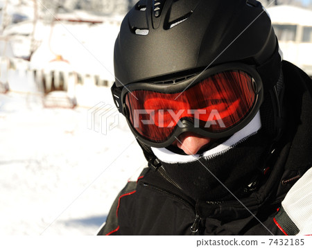 Skier with helmet on head 7432185