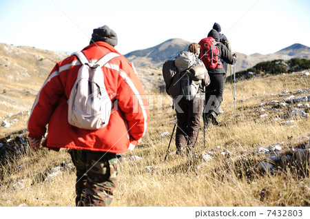 Sport hiking in mountains, walking and backpacking 7432803