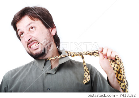 Man wearing shirt and tie with boring and angry expression on his face Man wearing shirt and tie with boring and angry expression on his face 7433182