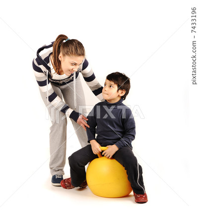 Family - young woman and kid - doing sport, fitness exercises Family - young woman and kid - doing sport, fitness exercises 7433196