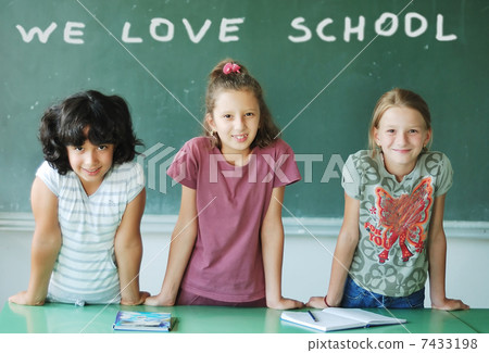 Classroom at school and text on green board 7433198