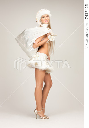 cheerful santa helper girl with big bag cheerful santa helper girl with big bag 7437425