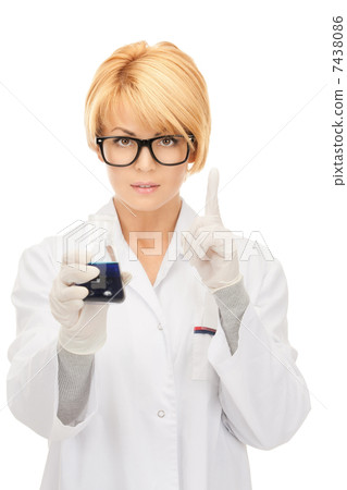lab worker holding up test tube lab worker holding up test tube 7438086