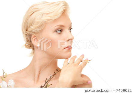 lovely woman with twig 7439081