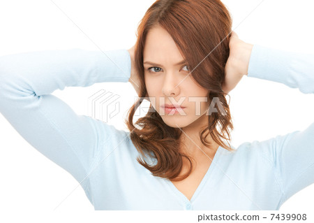 woman with hands on ears woman with hands on ears 7439908
