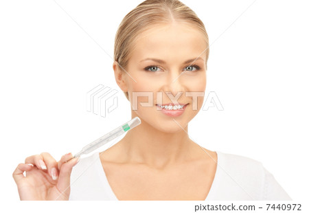 attractive female doctor with thermometer attractive female doctor with thermometer 7440972