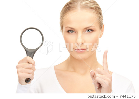 woman with magnifying glass woman with magnifying glass 7441175