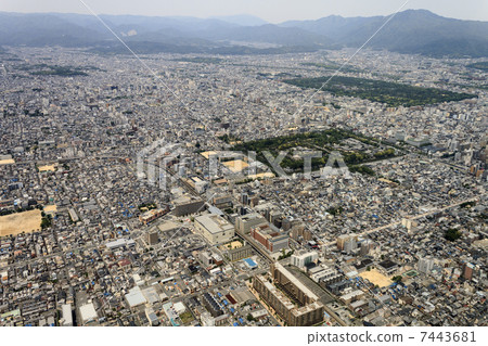 Aerial view of Kyoto Imperial Palace and Hiei direction from the sky near Kyoto City's Nijo 7443681