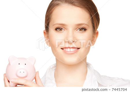 lovely woman with piggy bank 7445704