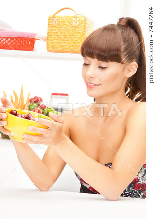 beautiful woman in the kitchen 7447264