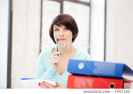 woman with folders 7447280