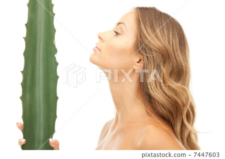 lovely woman with aloe vera 7447603
