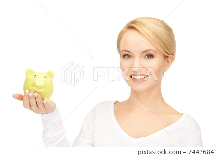 lovely woman with piggy bank lovely woman with piggy bank 7447684