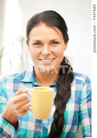 lovely housewife with mug 7447689