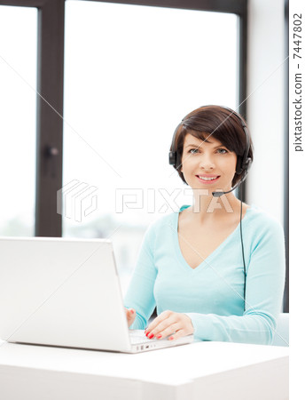 helpline operator with laptop computer 7447802