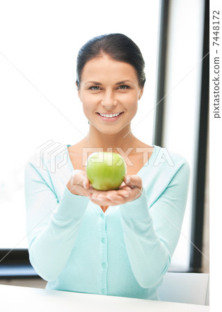 lovely housewife with green apple lovely housewife with green apple 7448172