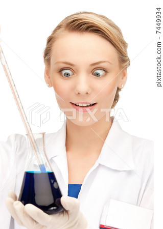 lab worker holding up test tube lab worker holding up test tube 7449934