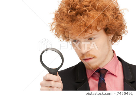 man with magnifying glass 7450491